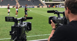 Cameraman catches the person using laser light on players in a football match
