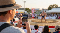 Foreign tourists get a grip on sumo beyond ringside